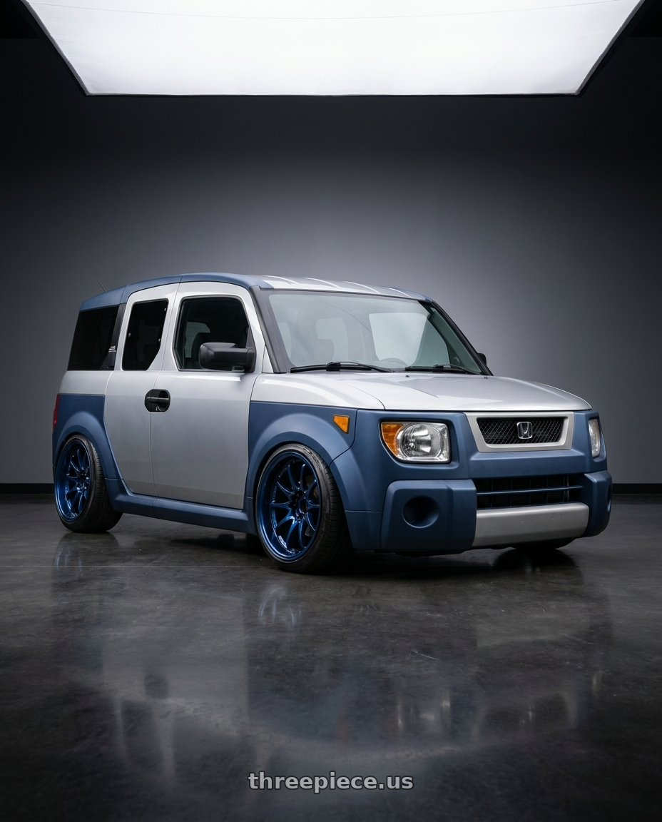 2006 Honda Element with Volk Racing CE28N-PLUS 5x114.3 18x10.5+15 Mag Blue wheels front three quarter view slammed stance