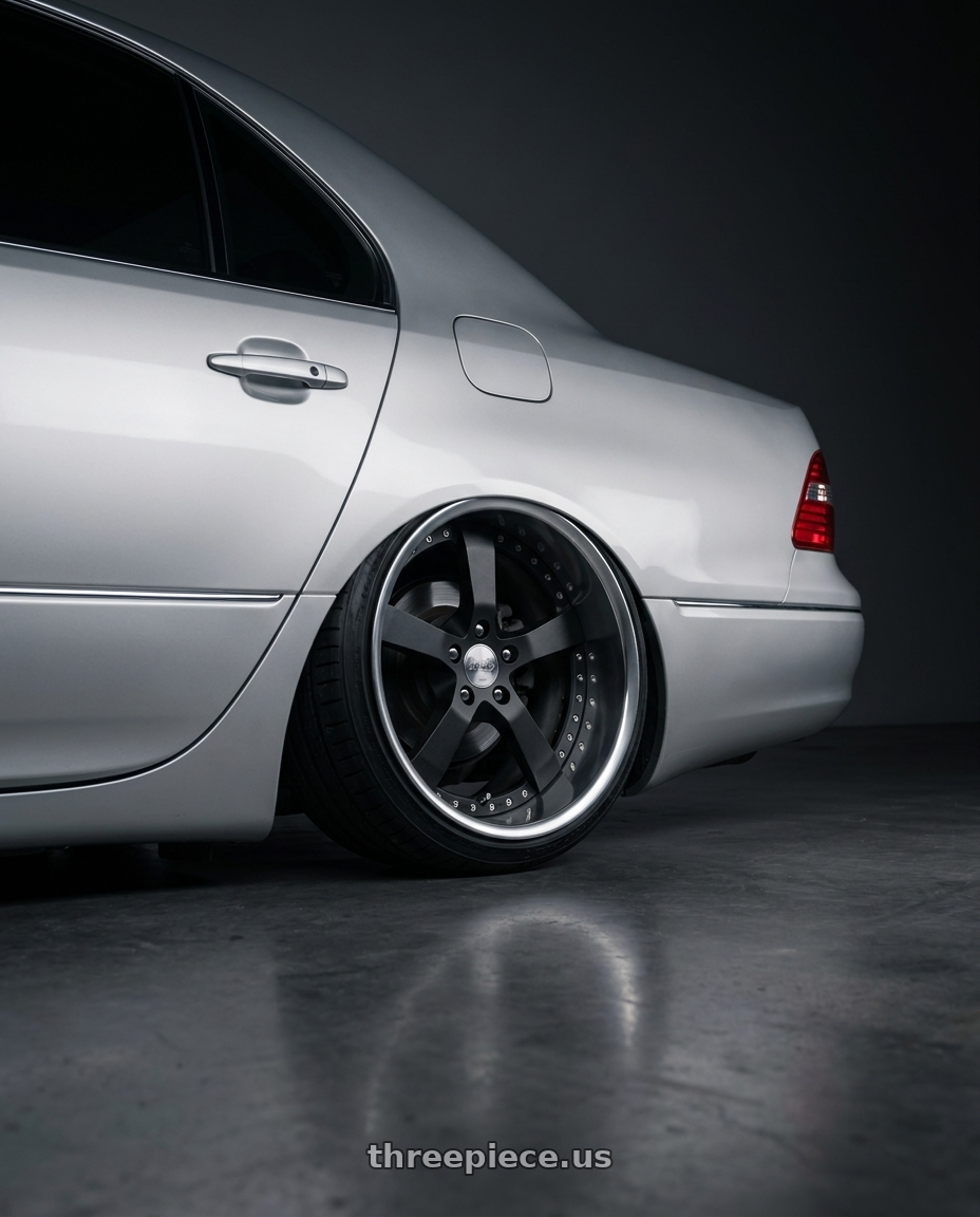 2004 lexus ls430 with Work Equip E05 5x114.3 20x9.5+35 r disk Black Anodized wheels rear three quarter view extreme stretch tires
