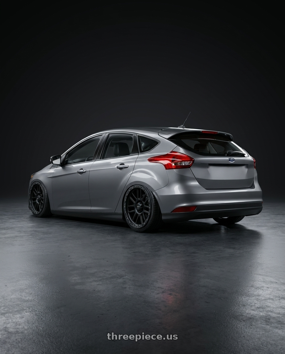 2017 Ford focus with Vision Off-Road 111 Nemesis 5x127 20x9+0 Matte Black wheels rear three quarter view slight stretch tires