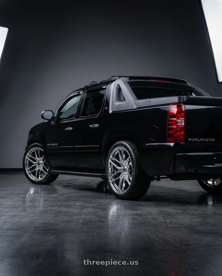 2007 Chevrolet Avalanche with TIS Motorsports 506C 6x139.7 26x10 +24 Chrome wheels rear three quarter view slight stretch tires