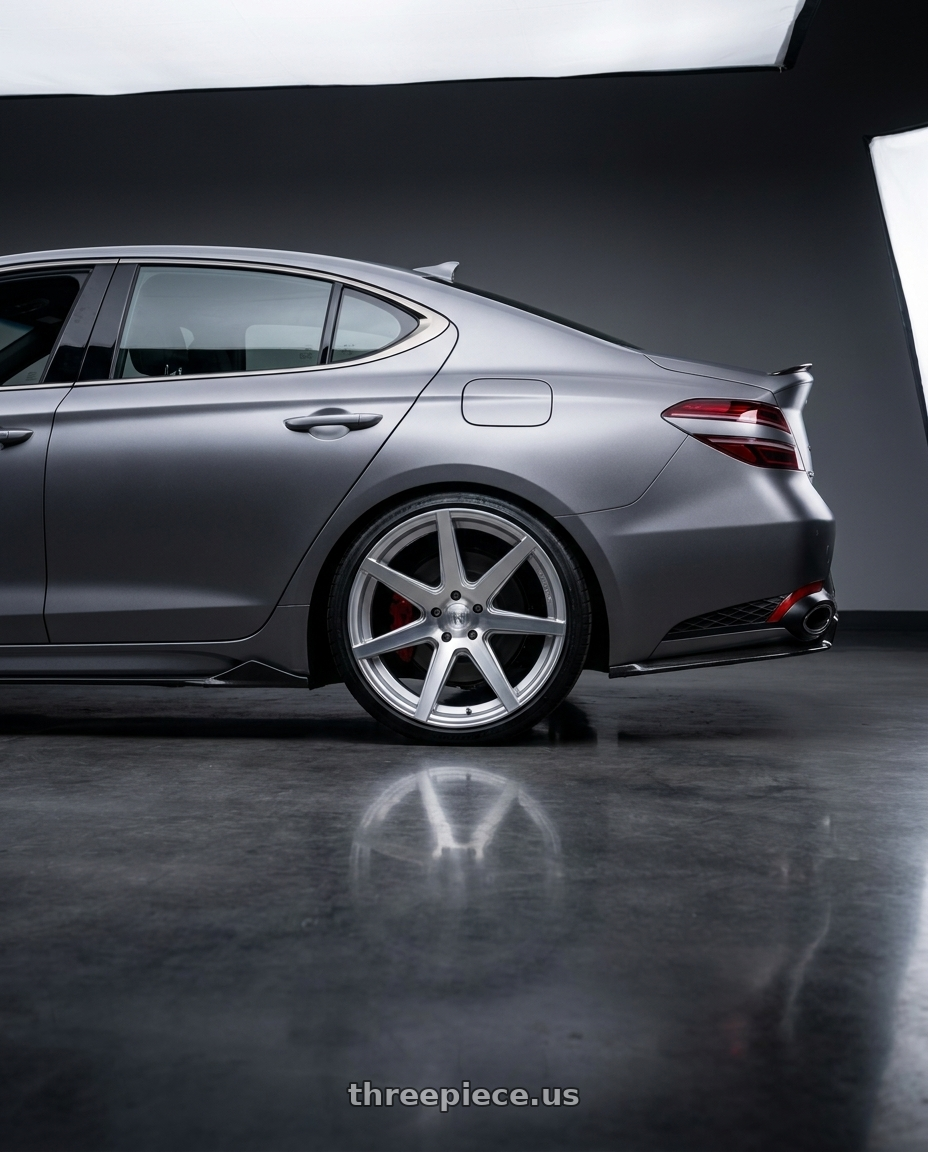 2024 Genesis g70 with Rohana RC7 5x114.3 20x10+40 Machine Silver wheels rear three quarter view slight stretch tires