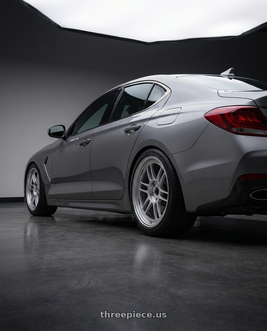 2021 Genesis G70 Sport with Enkei RPF1 5x114.3 18x8+35 Silver wheels rear three quarter view staggered tires
