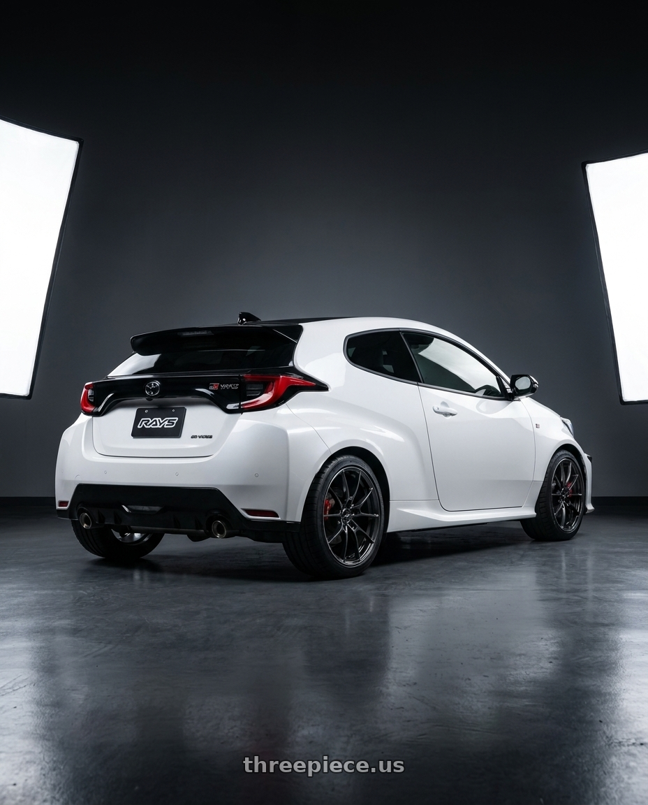 2021 gr yaris with Volk Racing G025 5x114.3 18x8.5+35 Shining Black Metal / Rim Edge DC wheels rear three quarter view square tires