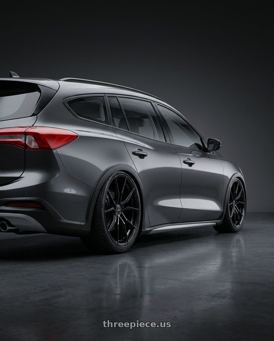 2023 Focus Active Wagon with Advanti Racing 80B Hybris 5X108 19x8.5 +45 Gloss Black wheels rear three quarter view slight stretch tires