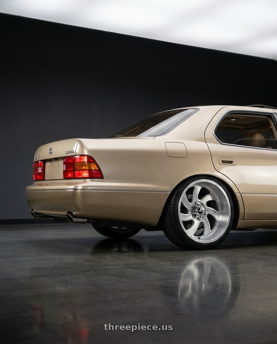 1999 Lexus ls400 base with Off Road Monster M07 8Lug Blank 20x10-19 Brushed Face Silver wheels rear three quarter view slight stretch tires
