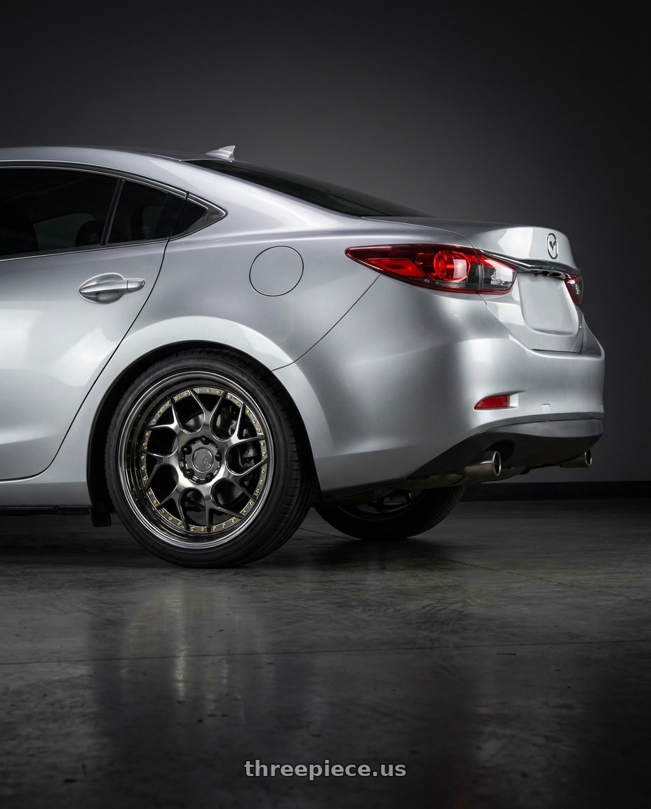 2016 Mazda 6 with Aodhan DS01 5x114.3 18x8.5+35 Black Vacuum W/ Gold Rivets wheels rear three quarter view square tires