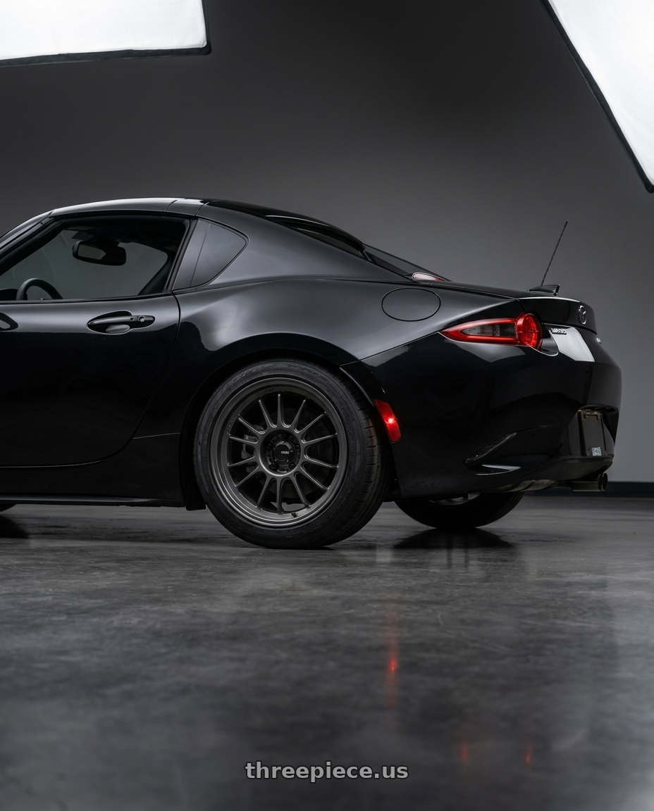 2016 mazda miata with Konig Hypergram 4x100 16x8+38 Matte Grey wheels rear three quarter view square tires