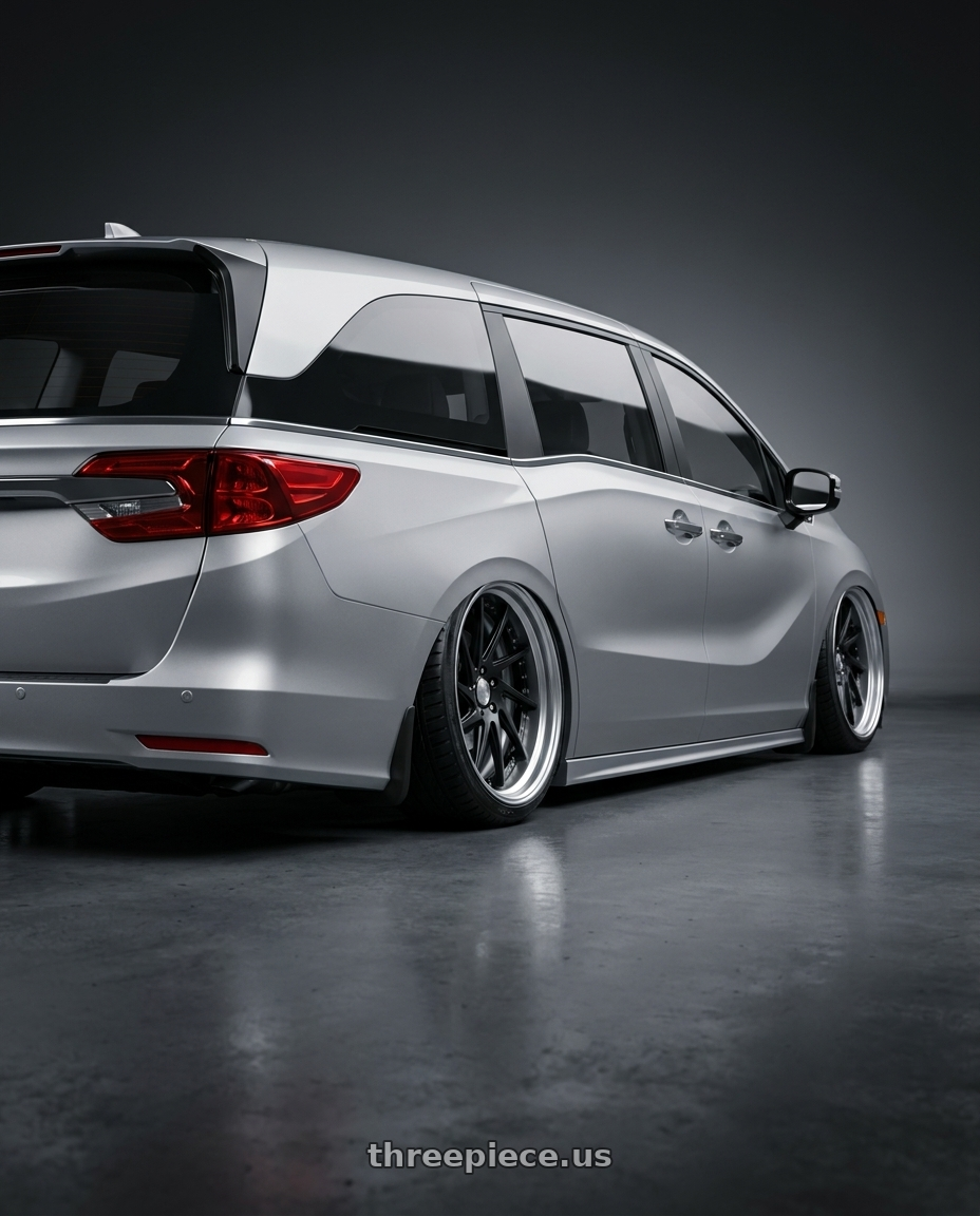 2024 Honda Odyssey  with Work Gnosis Cvs 5x120 20x8.5+45 O Disk Matte Black wheels rear three quarter view extreme stretch tires