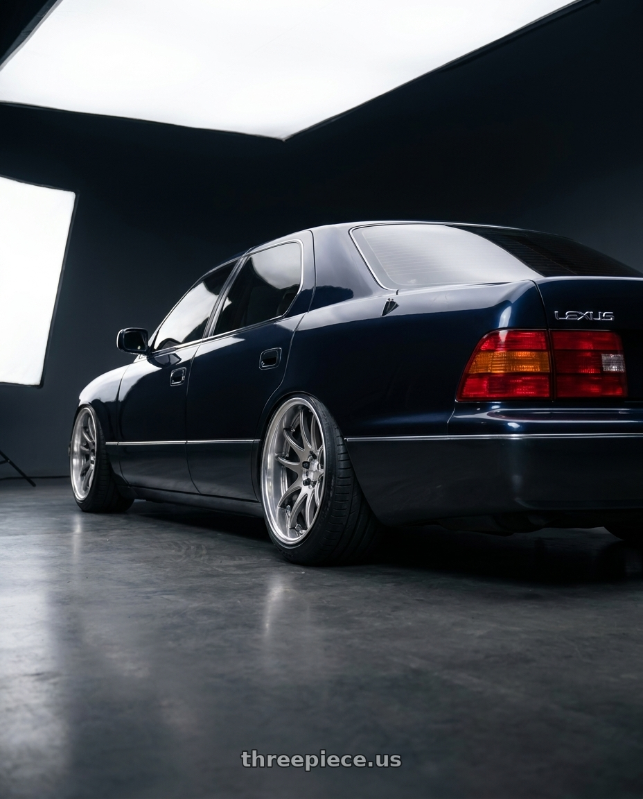 1997 Lexus LS400 with Work Cr 2P 5x114.3 19x8.0 +45 GT Silver wheels rear three quarter view meaty tires