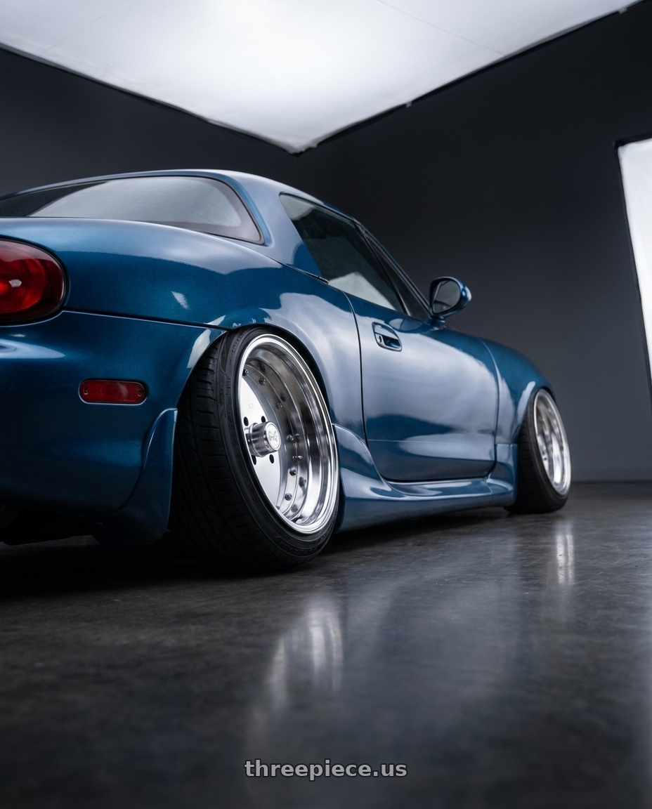 2000 Mazda Miata base with Speed Star Mk-I 4x100 15X9+-1  Polished wheels rear three quarter view extreme stretch tires