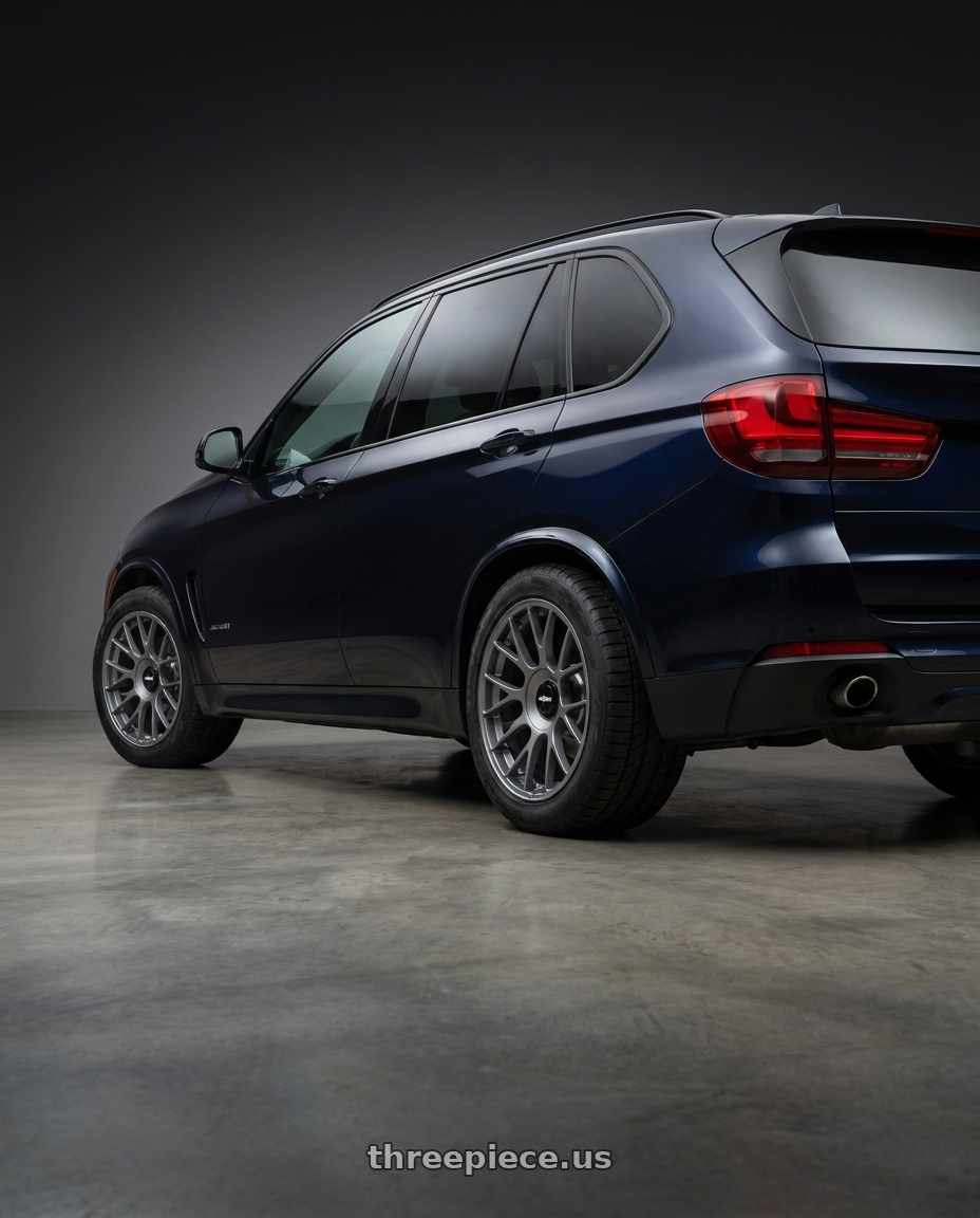 2014 BMW X5 with Rotiform 1PC R903 TUF 5X120 20X11 +43 SATIN TITANIUM wheels rear three quarter view meaty tires