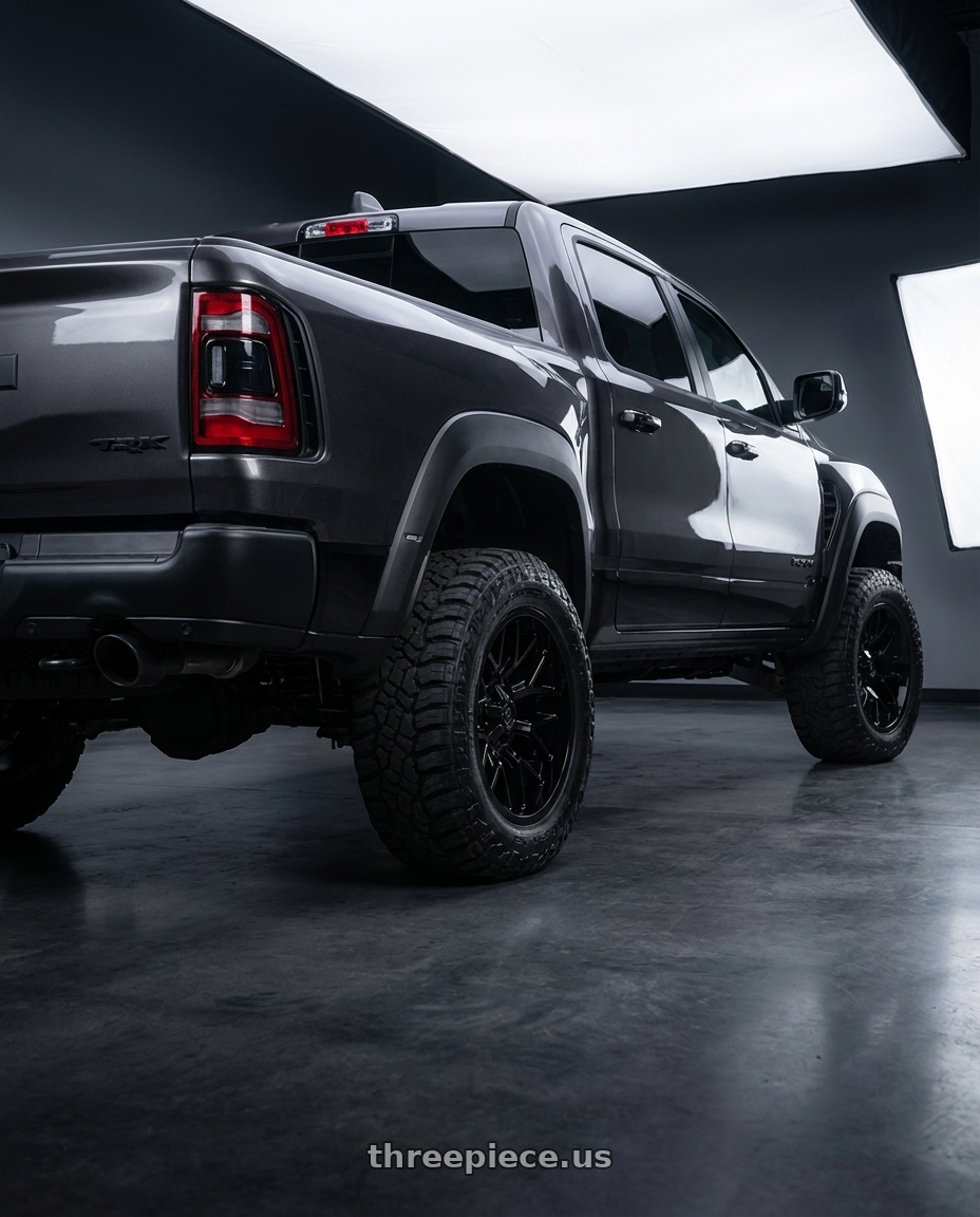 2022 Dodge Ram TRX with Gear Off Road 768B 5x114.3/5x127 20x10 -19 Gloss Black wheels rear three quarter view meaty tires