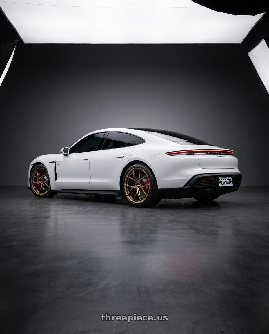 2022 porsche taycan with BBS FI-R CL 20x9.0+52 Matte Bronze wheels rear three quarter view square tires