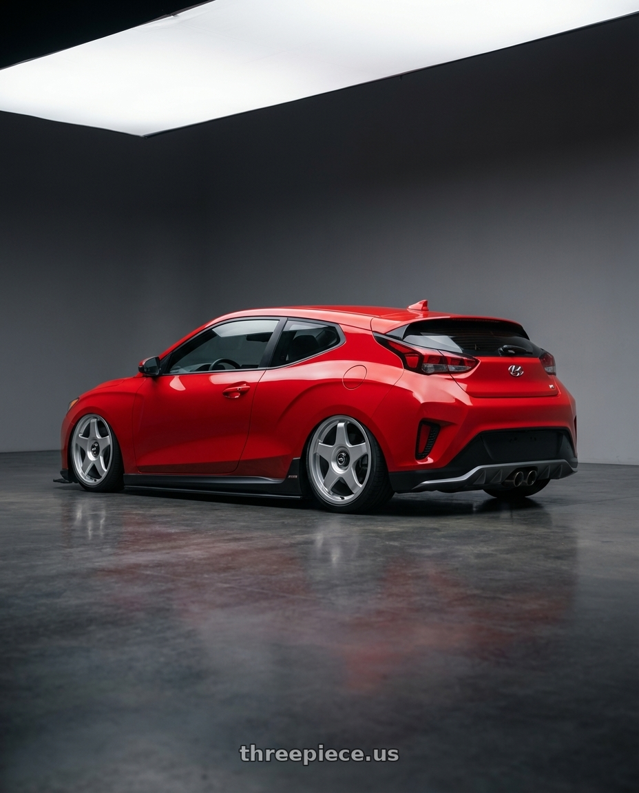 2022 Hyundai Veloster N with fifteen52 CHICANE 5x114.3 / 5x120 19x8.5 +35 SPEED SILVER (GLOSS SILVER) wheels rear three quarter view slight stretch tires