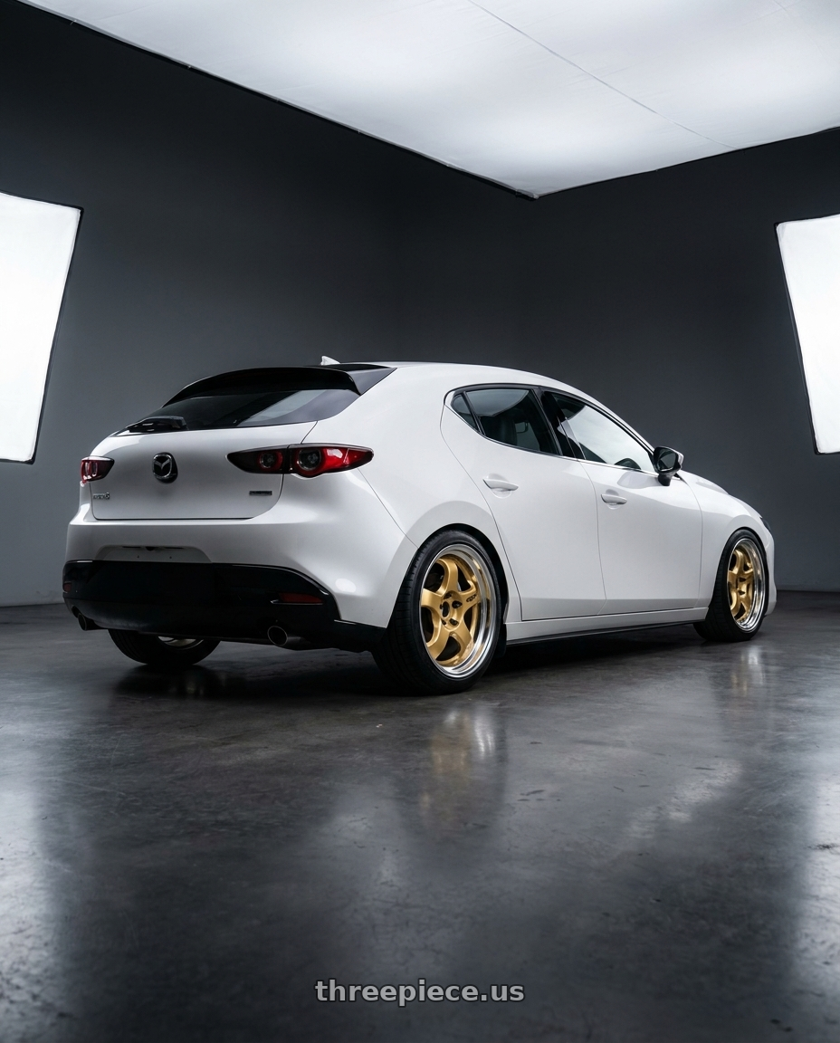 2021 Mazda 3 hatchback with Work Meister S1 3P 5x114.3 18x8.5+50 R Disk Bright Buff Finish wheels rear three quarter view square tires