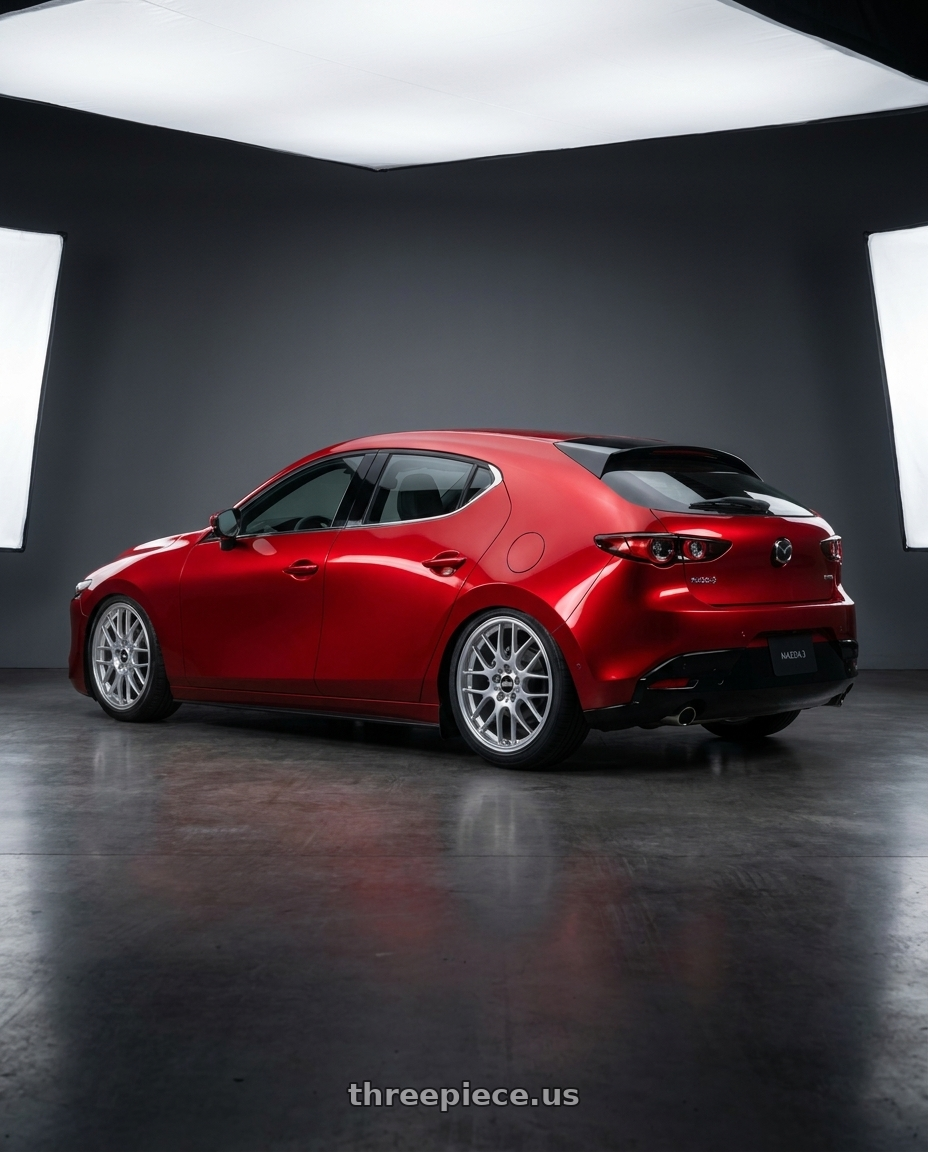 2024 Mazda 3 with BBS RG-R 5x120 19x8.5+32 Diamond Silver wheels rear three quarter view slight stretch tires