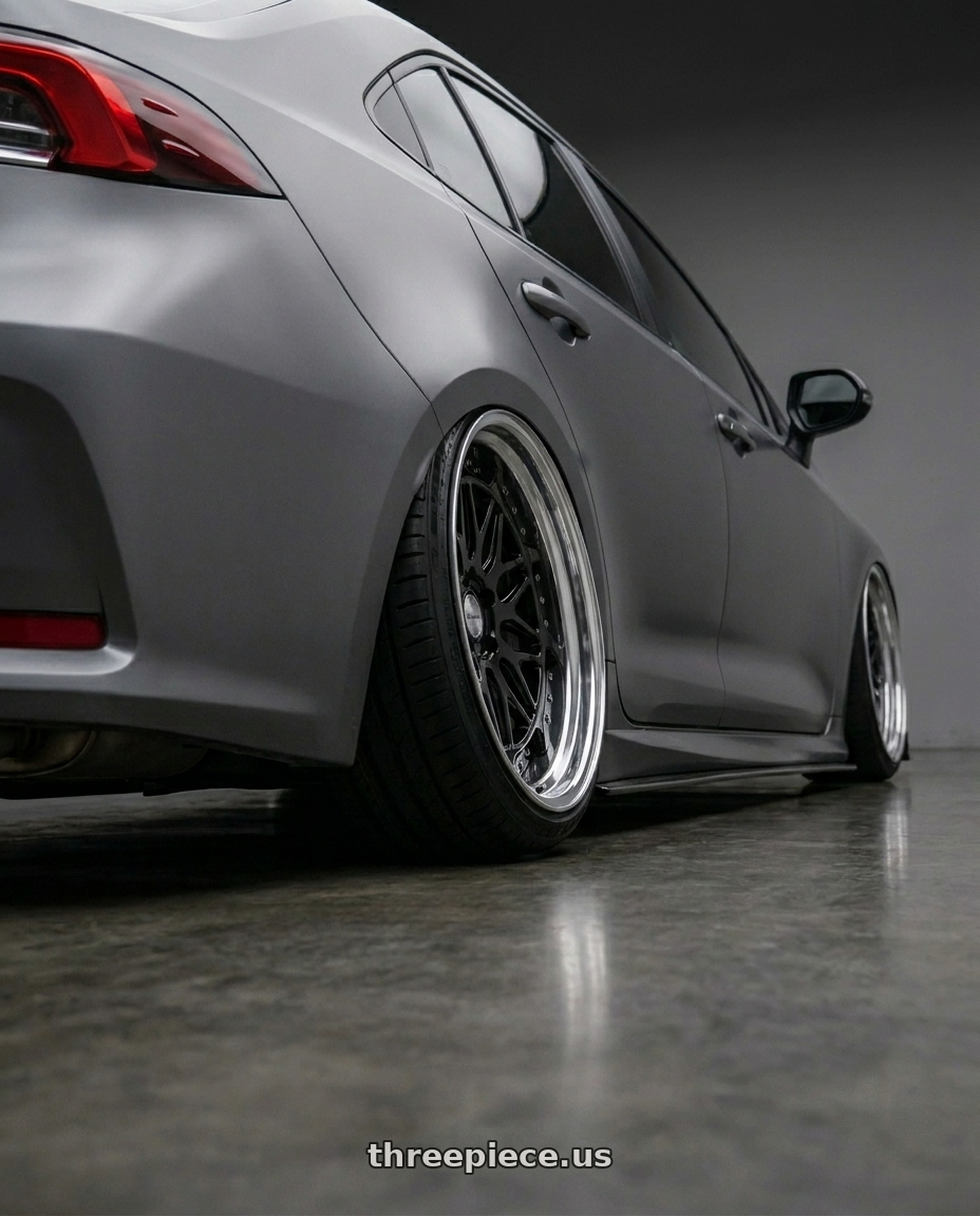 2022 Toyota altis gr with Work Gran Seeker Dmx 5x100 20x10+-7 A Disk Black wheels rear three quarter view extreme stretch tires