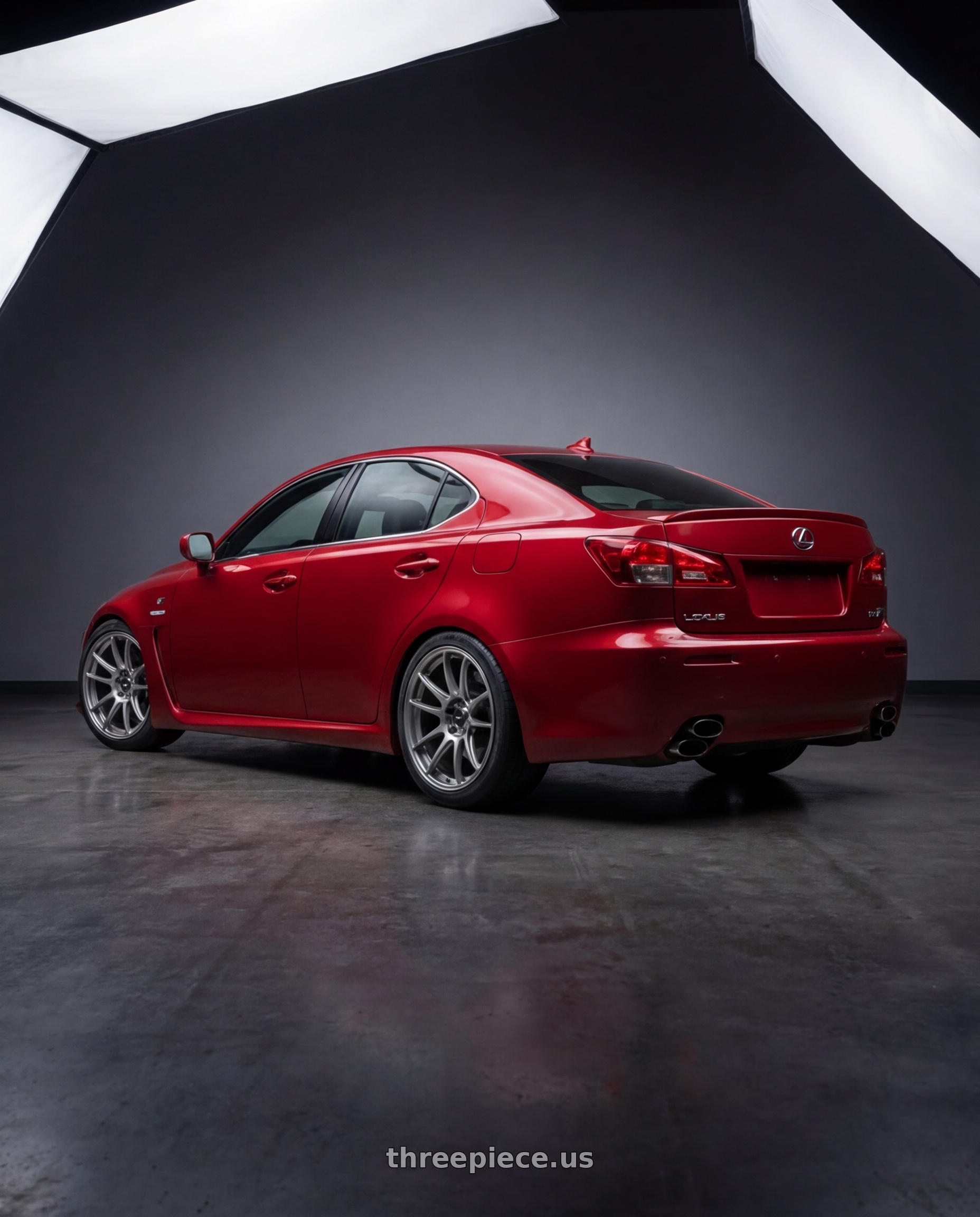 2012 Lexus IS-F with Konig Heliogram 5X114.3 19x9.5+35 Titanium Metallic Knurled Bead Flow Formed wheels rear three quarter view square tires