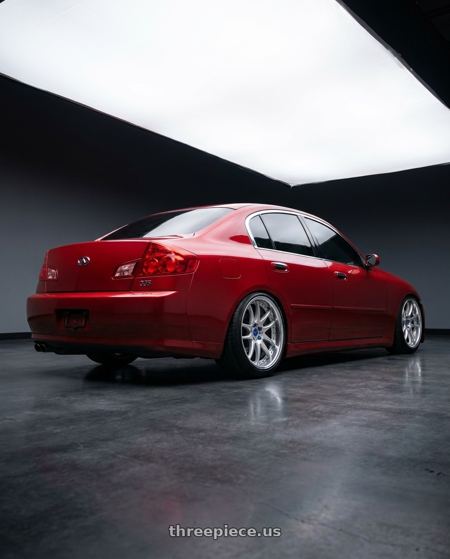 2006 Infiniti g35 Sedan with Work Emotion CR 3P wheels rear three quarter view slight stretch tires