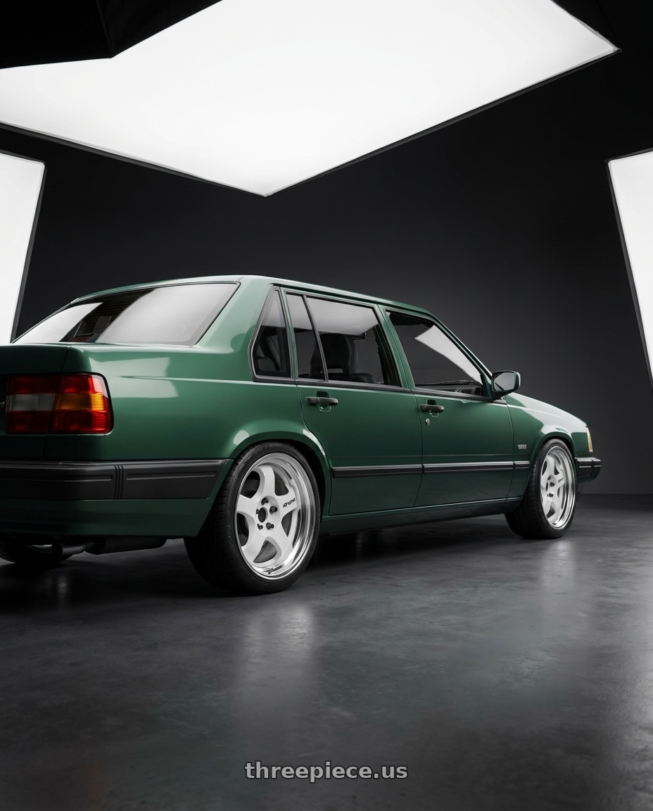 1991 Volvo 940 se with Work Meister S1 2P 5x108 15x6.5+12 A Disk Black wheels rear three quarter view square tires