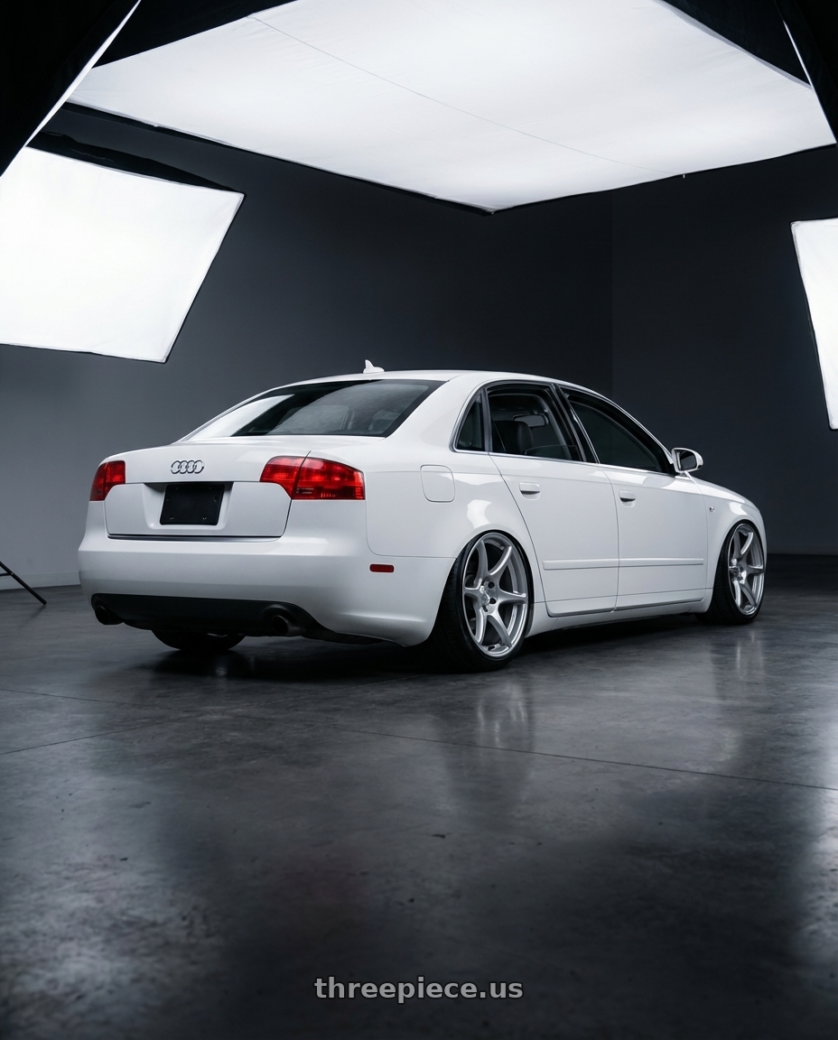 2010 Audi A4 B7 with Kansei K11S Tandem 5X112 19x9.5 22 Hyper Silver wheels rear three quarter view slight stretch tires