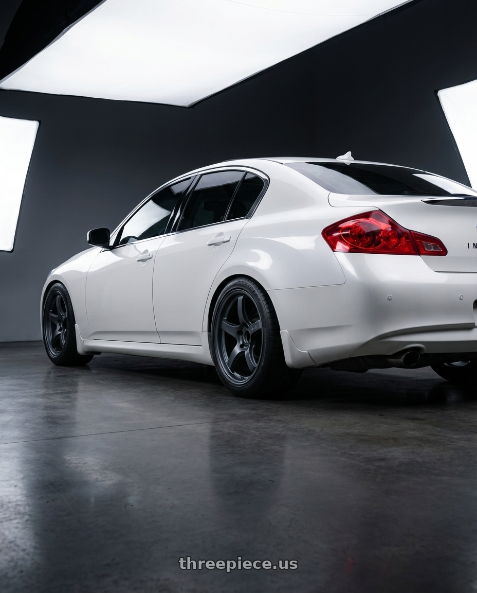 2014 Infiniti G37 Coupe with Gram Lights 57CR 5x114.3 19x9.5+35 Gunblue II wheels rear three quarter view square tires