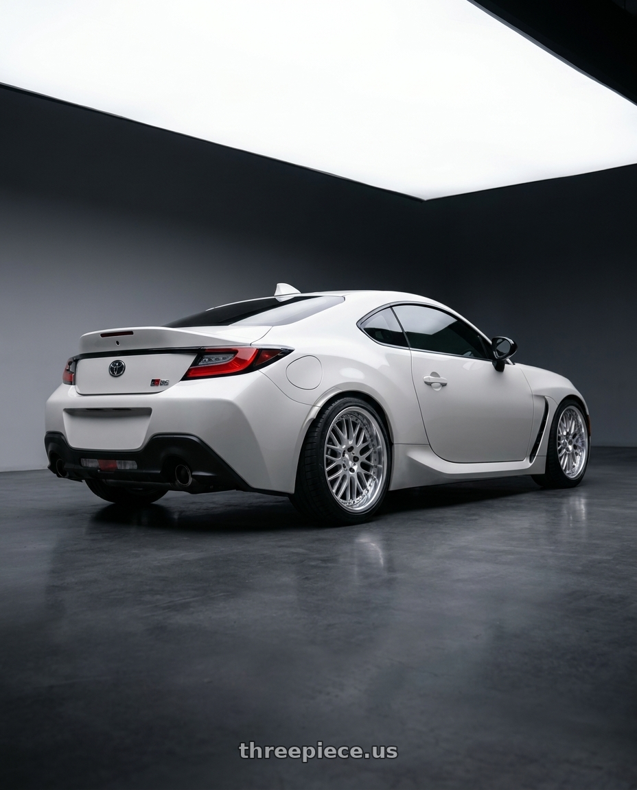 2026 Toyota gr86 with Work Lanvec Lm1 5x100 18x8.5+38 O Disk Machine Silver Polish wheels rear three quarter view square tires