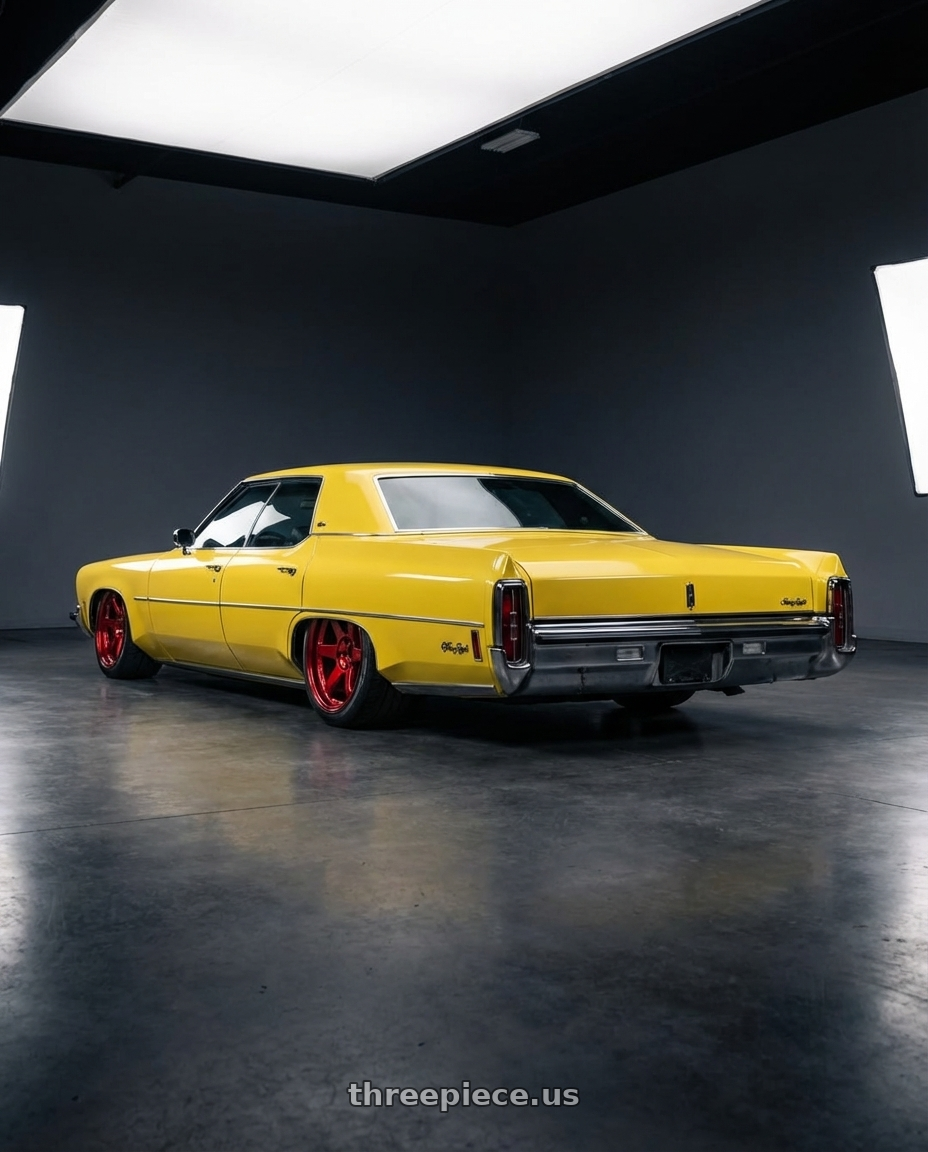 1972 Oldsmobile Ninety Eight with Volk Racing TE37SL 5x120 19x9.5 +21 RED wheels rear three quarter view extreme stretch tires