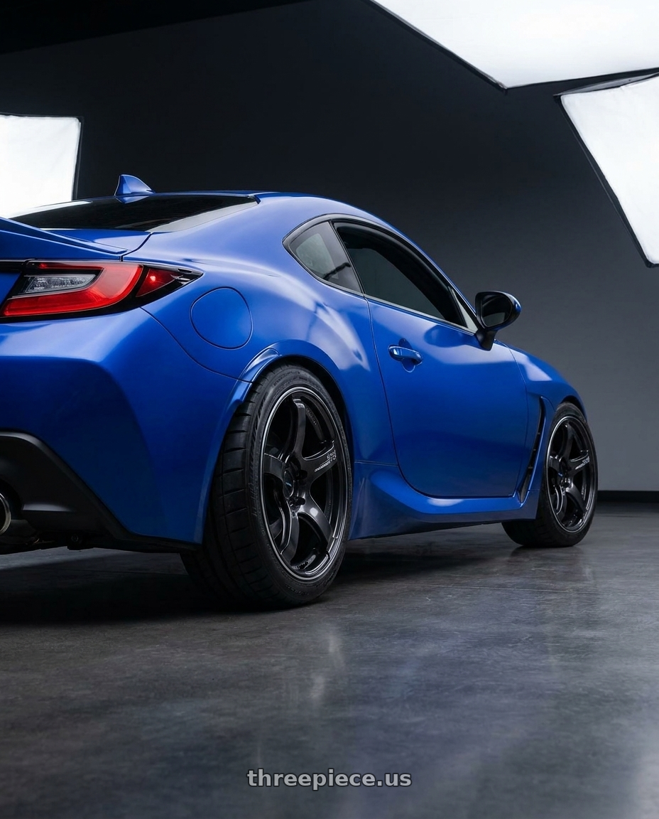 2025 subaru brz with Advan Racing TC4 5x100 18x8.5 +45 BLACK GUNMETALLIC & RING wheels rear three quarter view meaty tires