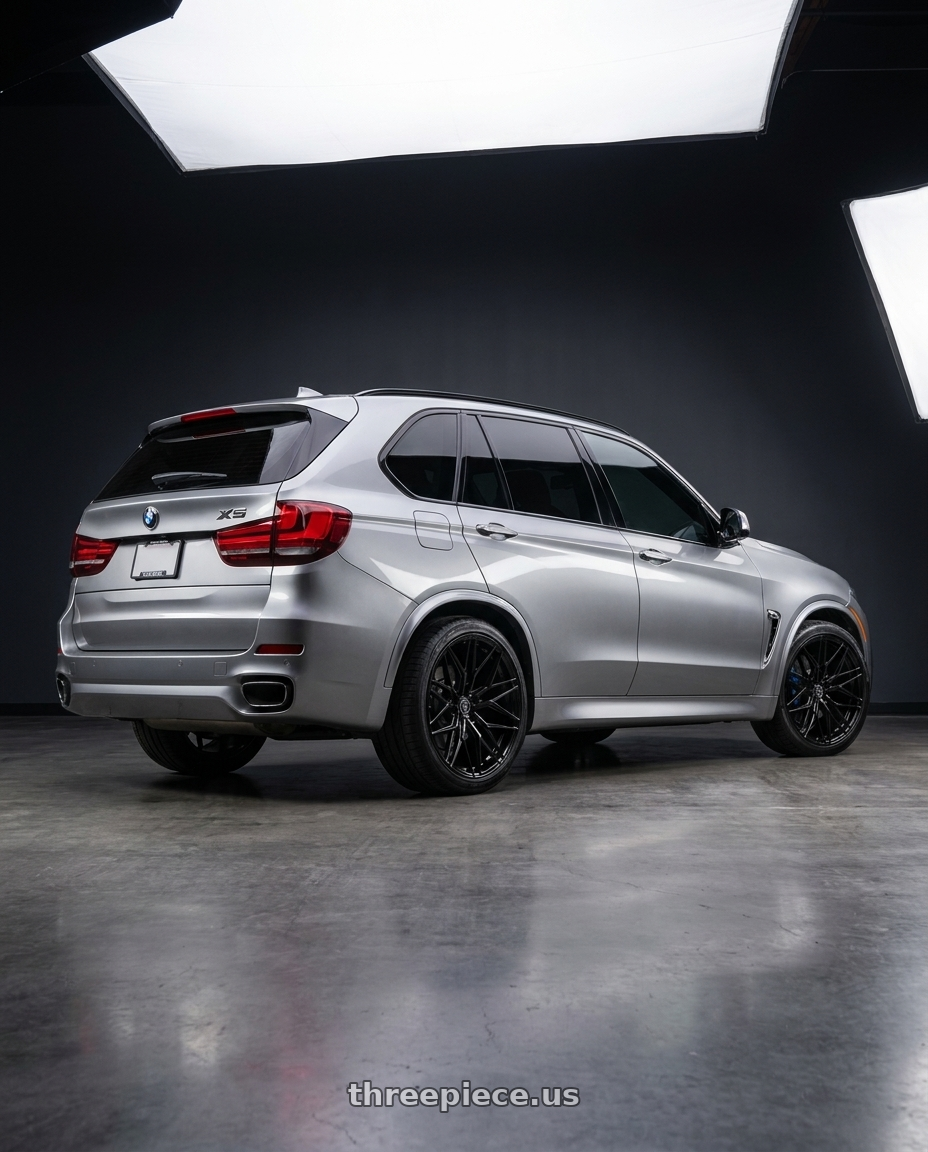 2016 BMW X5 F15 with Rohana RFX17 5x120 20x10+38 Gloss Black wheels rear three quarter view square tires