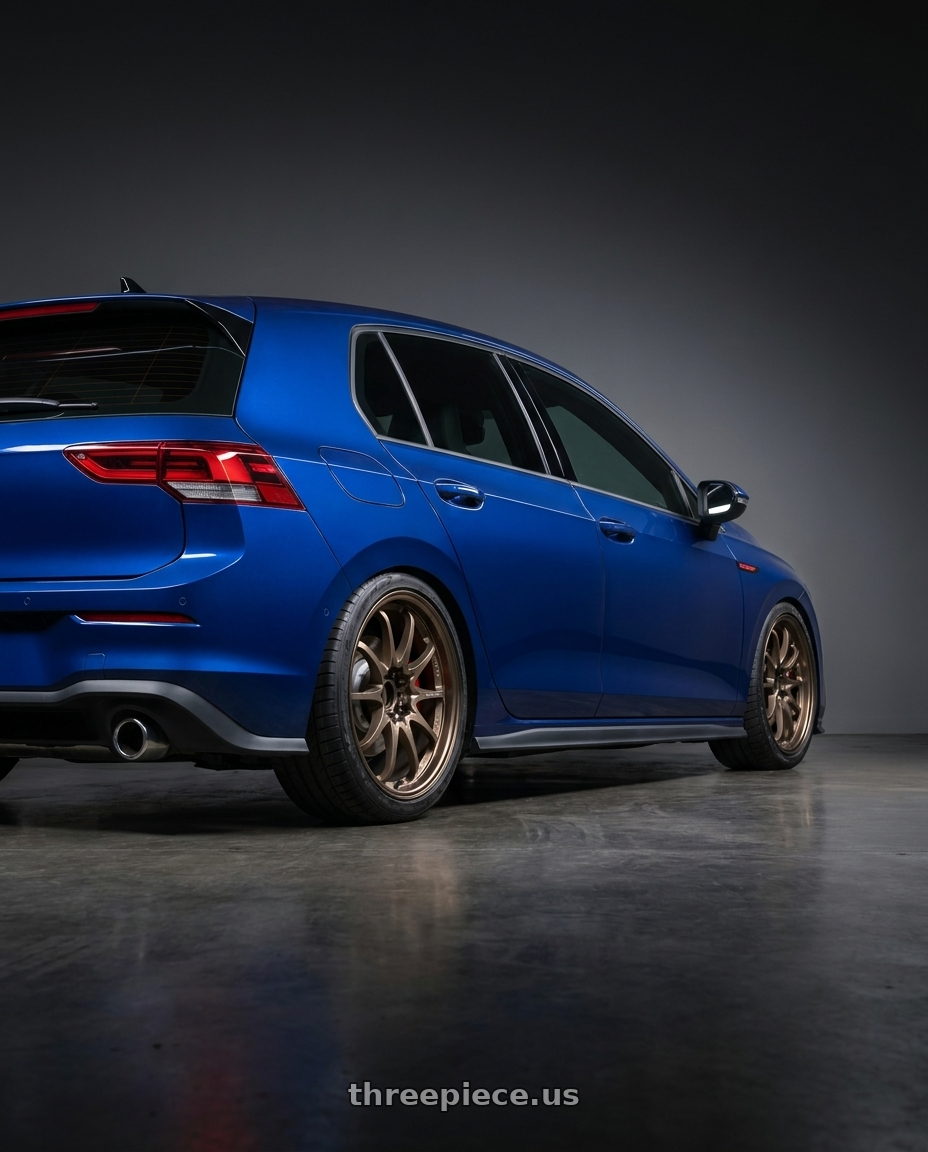 2023 golf gti with Volk Racing CE28N 5x114.3 18x8.5 +30 BRONZE wheels rear three quarter view square tires