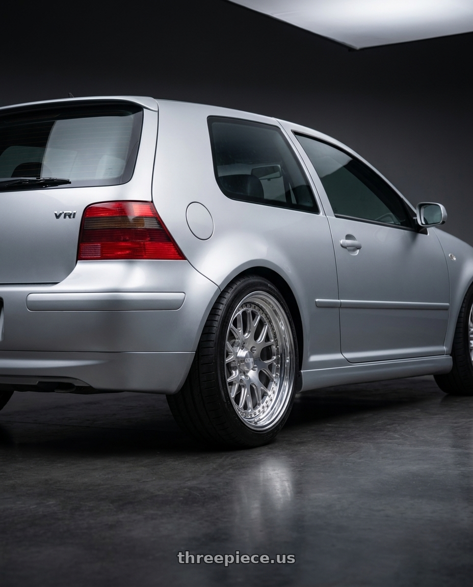 2004 Volkswagen Golf GTI VR6 with CCW CZ14 5x100 17x7 +35 Polished wheels rear three quarter view square tires