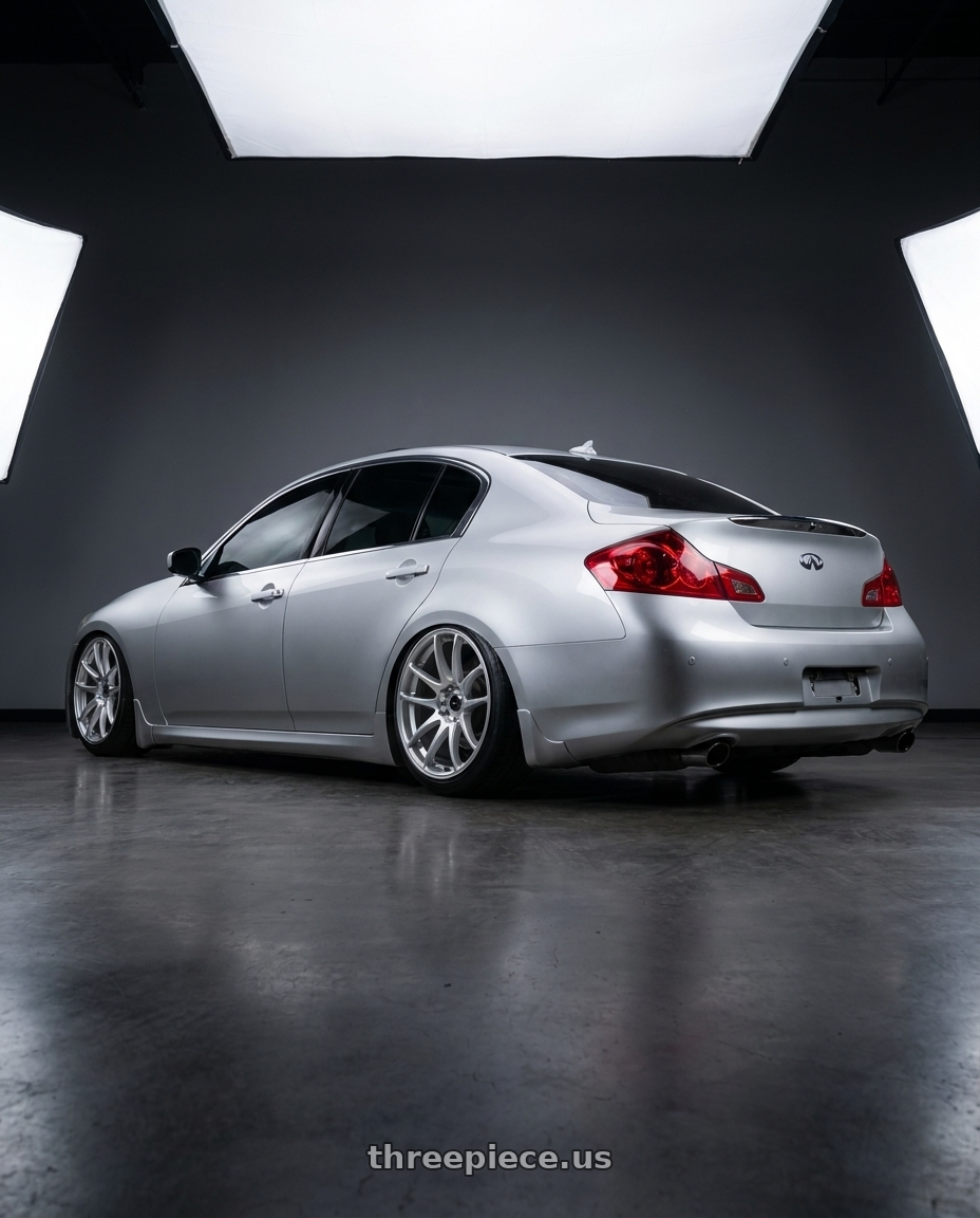 2011 Infiniti g37 with Vors TR4 5x114.3 19x9.5  +22 Silver Machine Face wheels rear three quarter view slight stretch tires