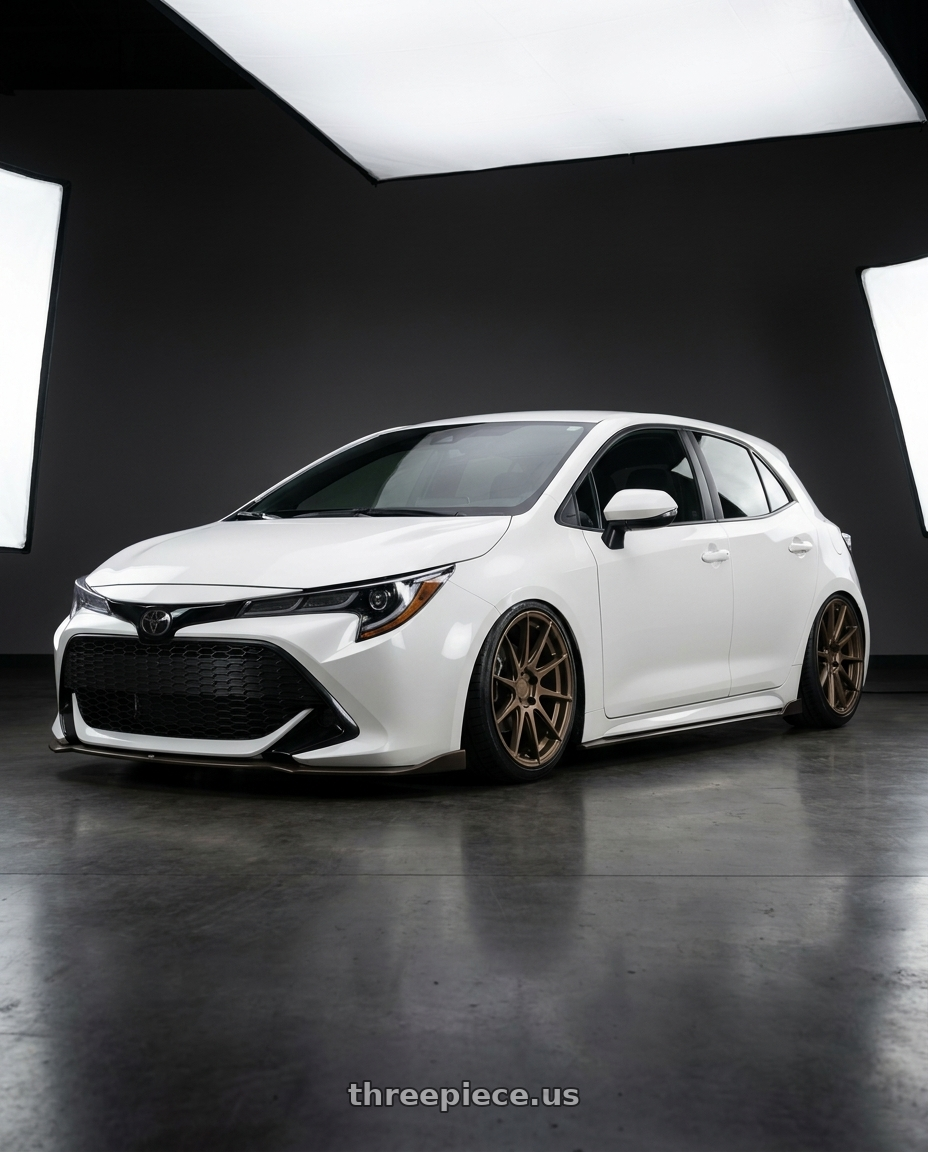 2023 Toyota Corolla Hatchback with Aodhan AH09 5x114.3 18x9.5 +35 Matte Bronze wheels