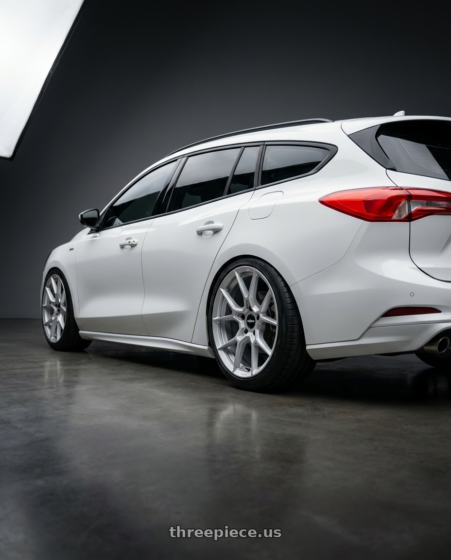 2024 ford focus with Rotiform RC199 KPR 5X112 19x8.5 +45 SILVER wheels rear three quarter view meaty tires
