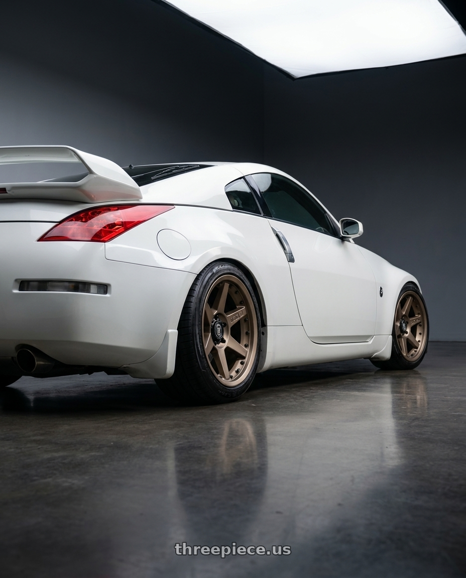 2007 Nissan 350z with Icon Alloys REBOUND PRO 6x135 17x8.5+6 BRONZE wheels rear three quarter view slight stretch tires
