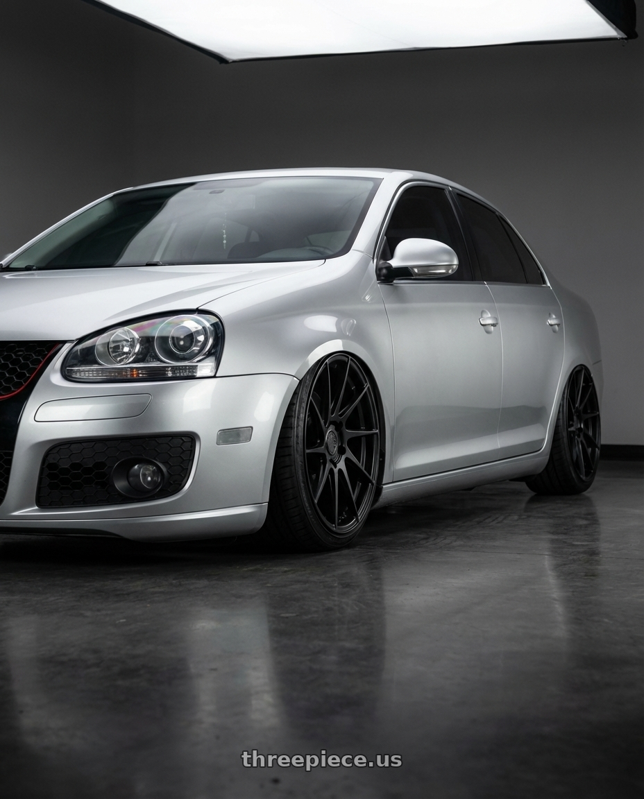 2009 Volkswagen Jetta GLI MK5 with Aodhan AH09 5x112 18x9.5 +35 Matte Black wheels