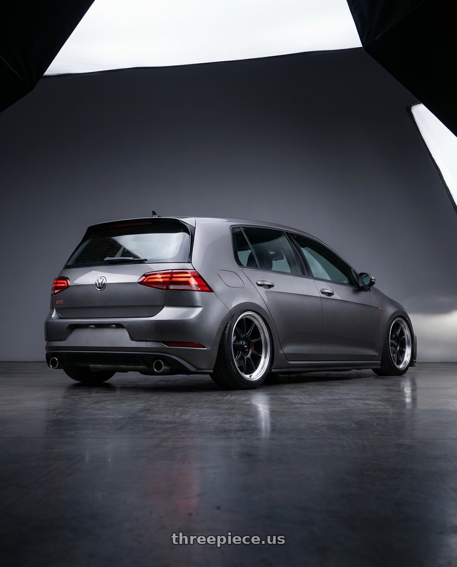 2019 Volkswagen GTI MK7 with Konig Countergram 5x112 19x11+40 Matte Black / Matte Machined Lip wheels rear three quarter view slight stretch tires