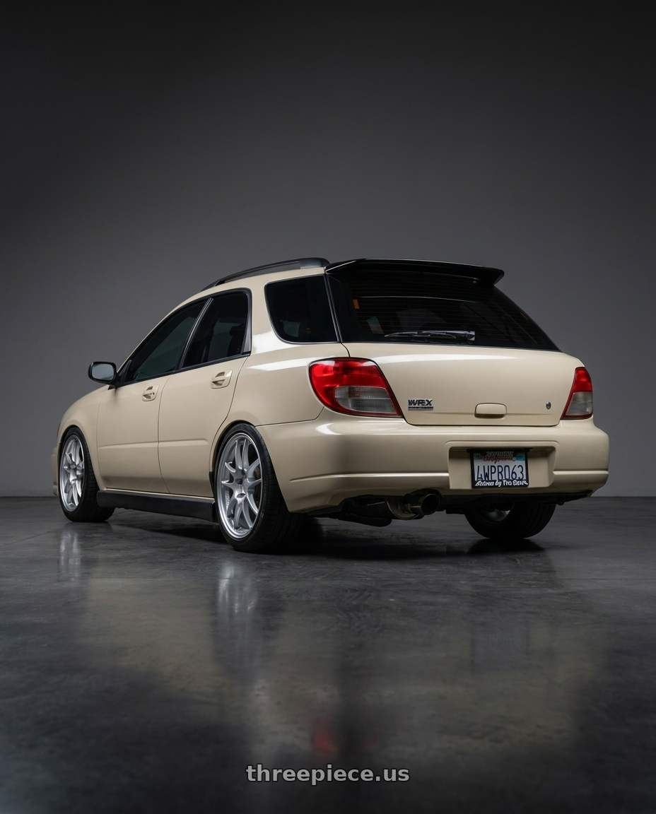 2002 Subaru Wrx with Enkei PF01 5x100 17x8+35 Silver wheels rear three quarter view square tires