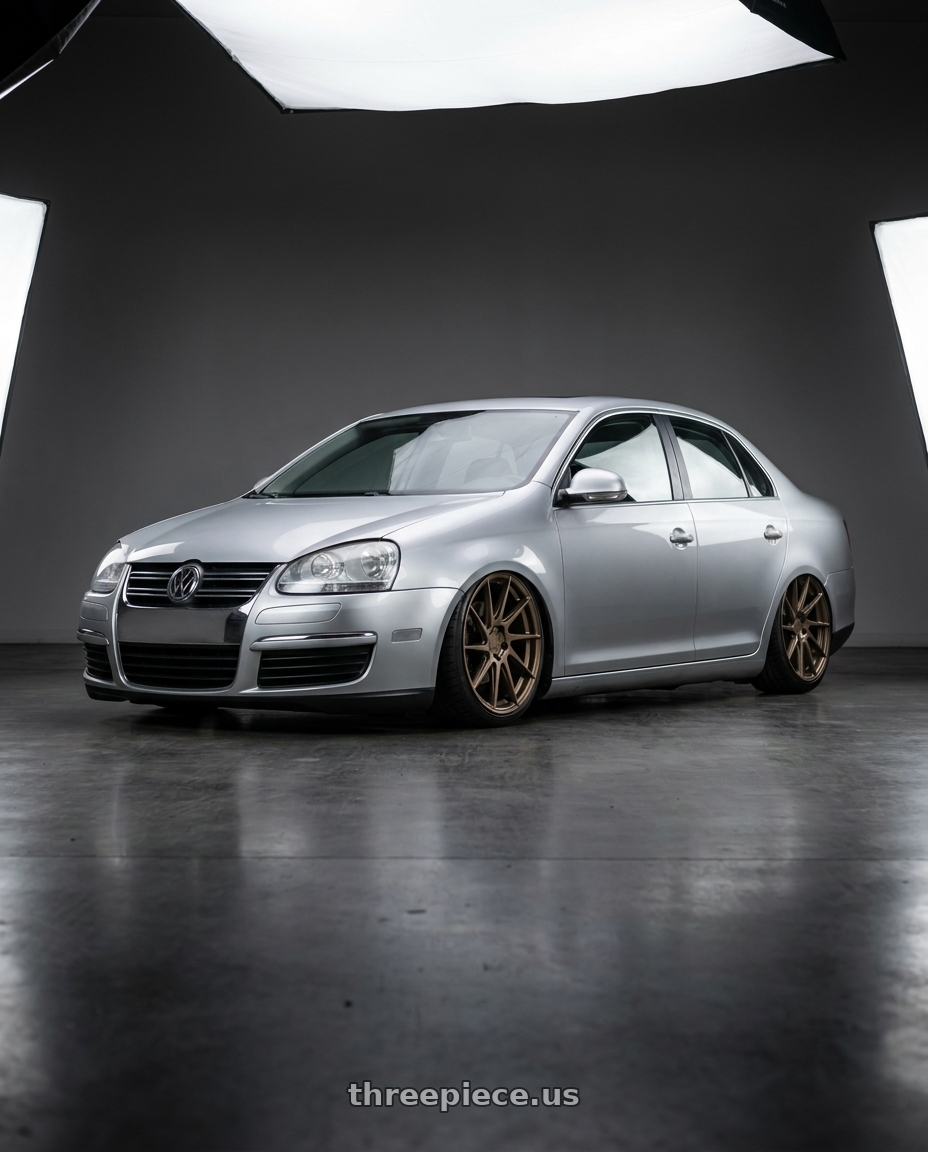 2009 Volkswagen Jetta GLI MK5 with Aodhan AH09 5x112 18x9.5 +35 Matte Bronze wheels
