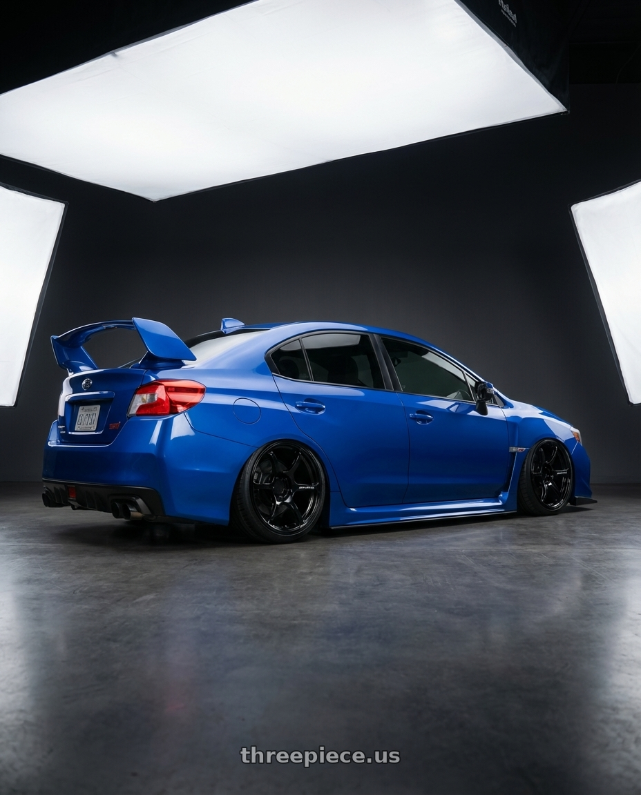 2013 Subaru WRX STI with Advan RGIII 5x114.3 18x8.5+31 Gloss Black wheels rear three quarter view slight stretch tires