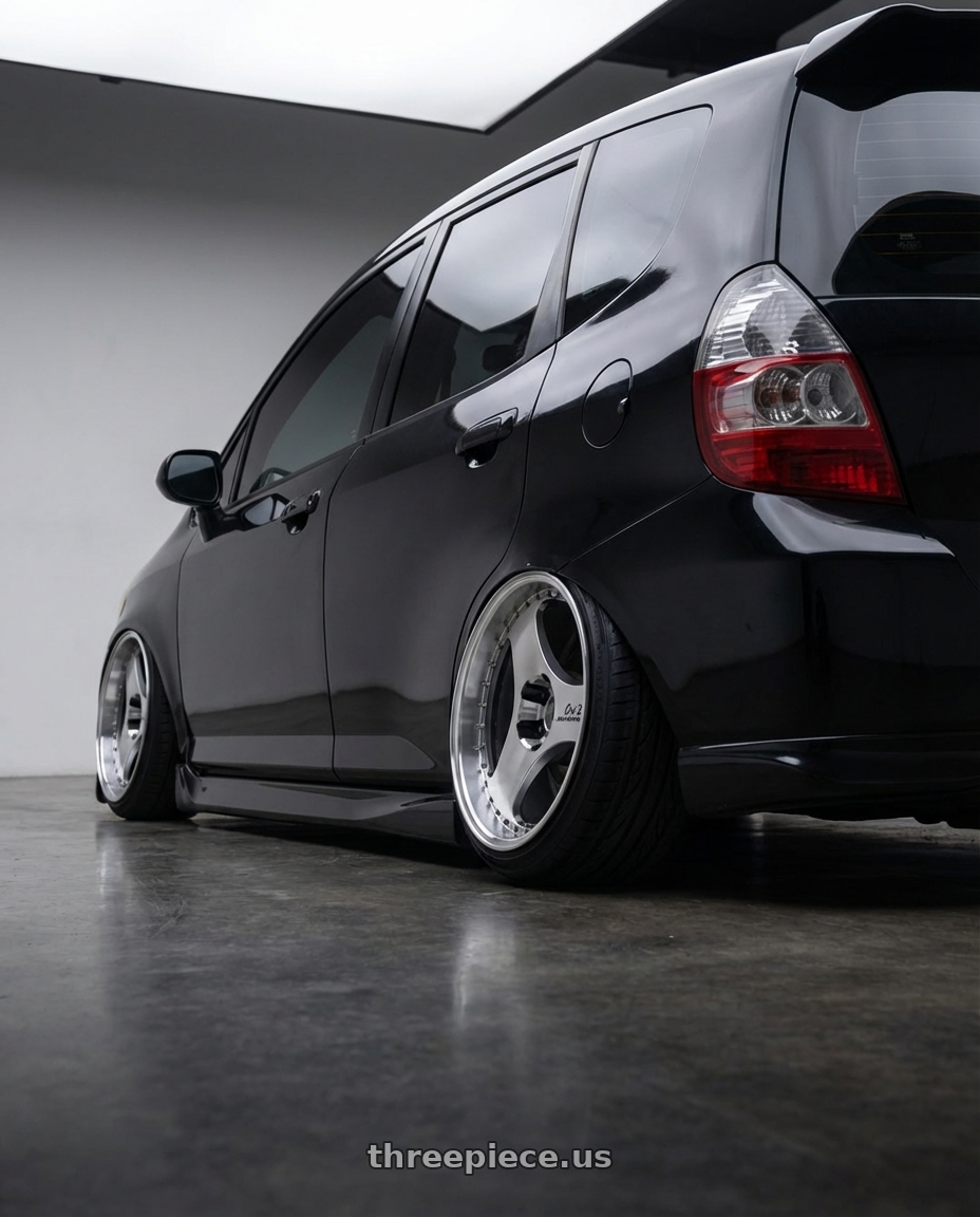 2008 honda fit sport with Advan Racing ONI2 PROGRESSIVE 5x114.3 20x10.5 +20 MACHINING & DIAMOND CUT wheels rear three quarter view extreme stretch tires