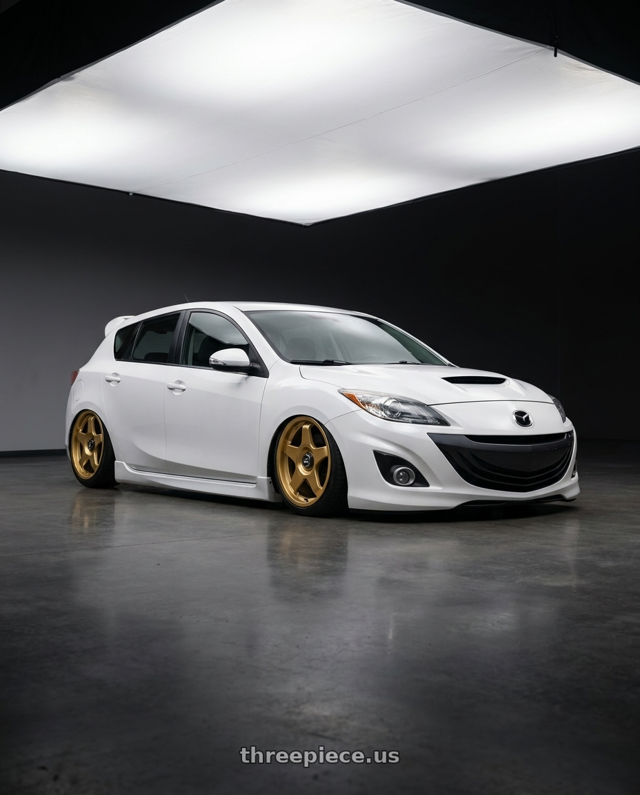 2012 Mazda Mazdaspeed3 with fifteen52 CHICANE 5x114.3 / 5x100 18x8.5 +35 GOLD (GLOSS GOLD) wheels