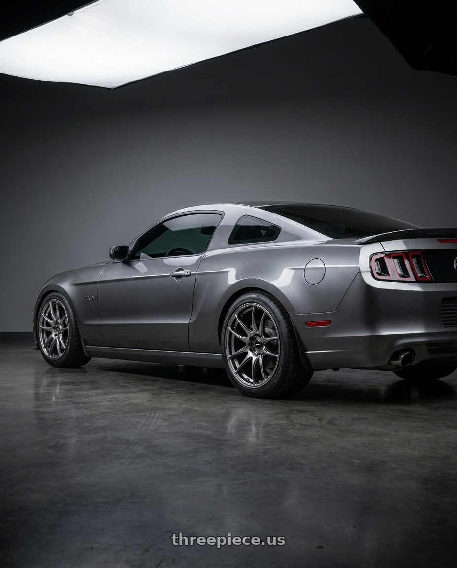 2014 Ford Mustang GT with Vors TR4 5x114.3 19x9.5  +35 Hyper Black wheels rear three quarter view square tires