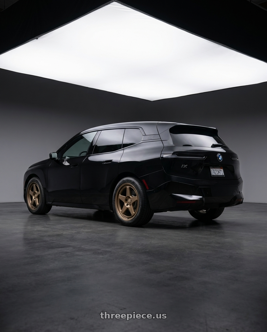 2024 bmw ix xdrive50 with Kansei K12B KNP 5X112 18x8.5 35 Bronze wheels rear three quarter view square tires