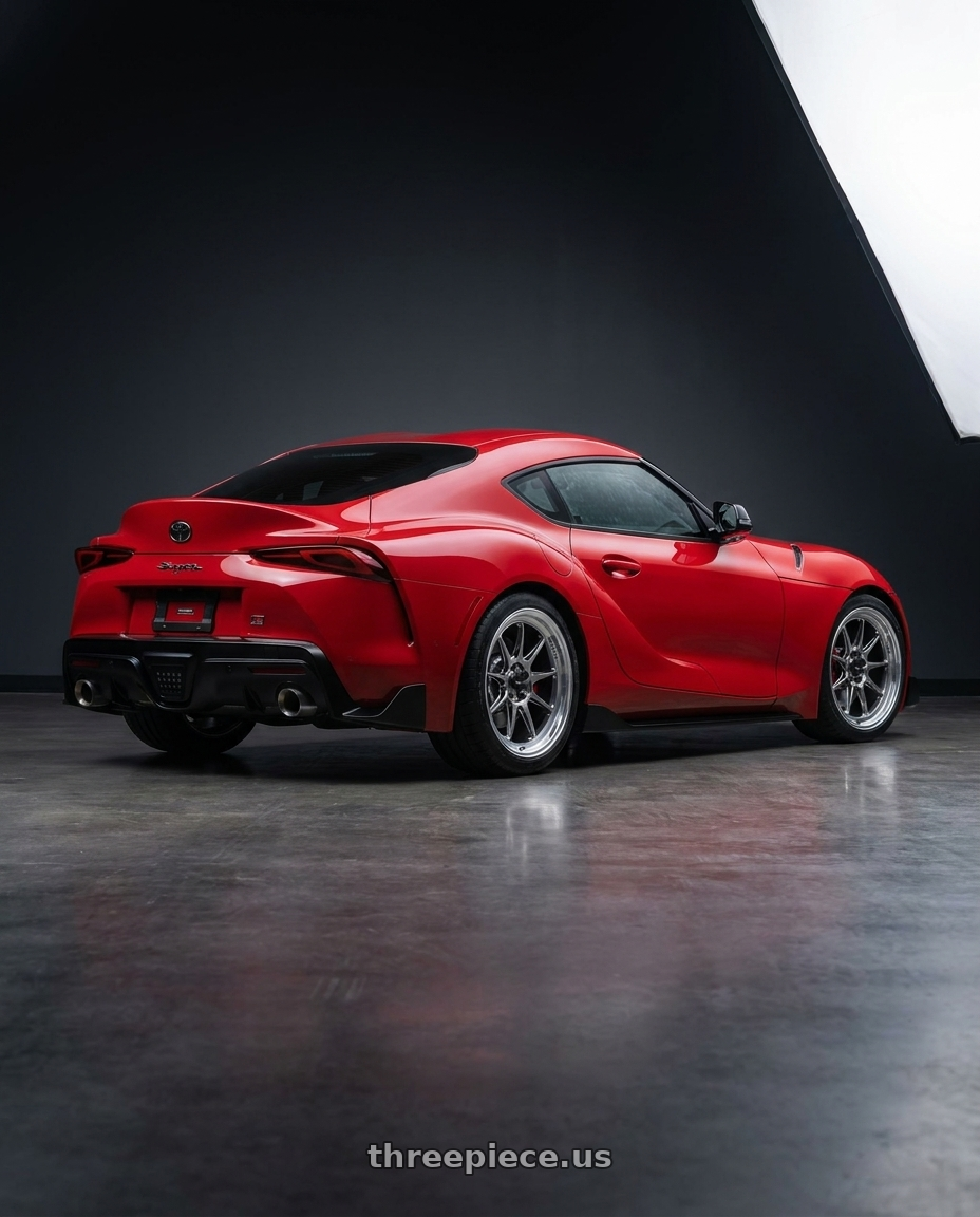 2023 Toyota GR Supra with Konig Countergram 5x112 19x11+40 Hyper Chrome / Machined Lip wheels rear three quarter view square tires