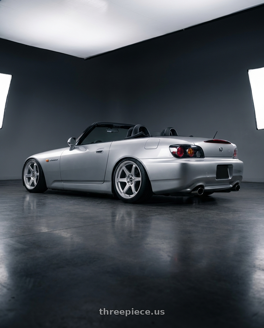 2009 Honda S2000 with ESR Wheels APEX SERIES AP6 5x114.3 18x9.5 +22 Hyper Silver wheels rear three quarter view slight stretch tires
