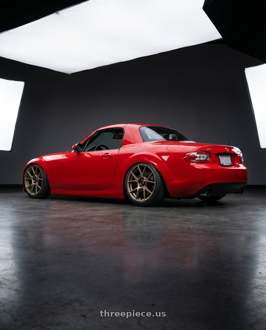 2012 Mazda MX-5 Miata NC with Konig Ampliform 5x114.3 17x9+40 Gloss Bronze wheels rear three quarter view slight stretch tires