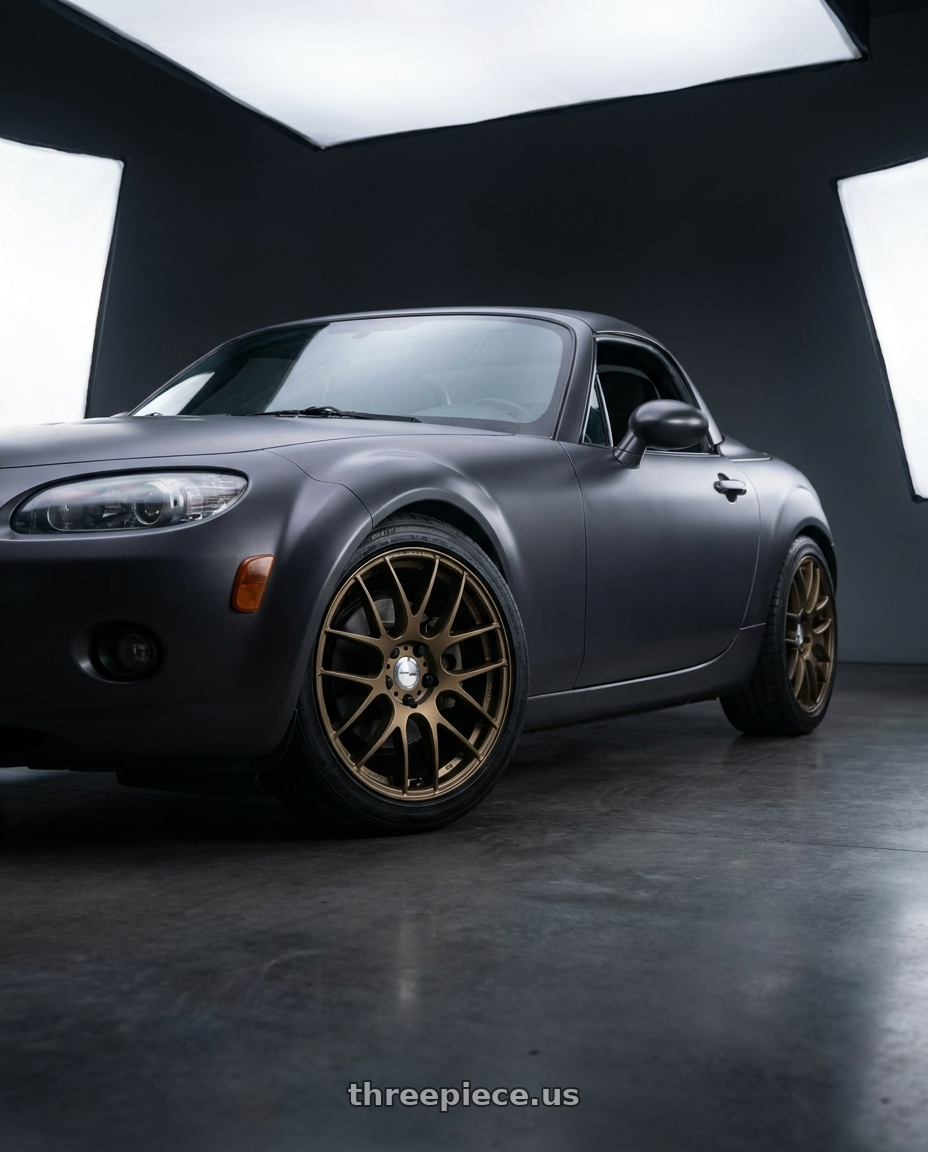 2007 Mazda Miata MX-5 with Work Emotion m8r 5x114.3 17x7 +47 Matte Bronze wheels