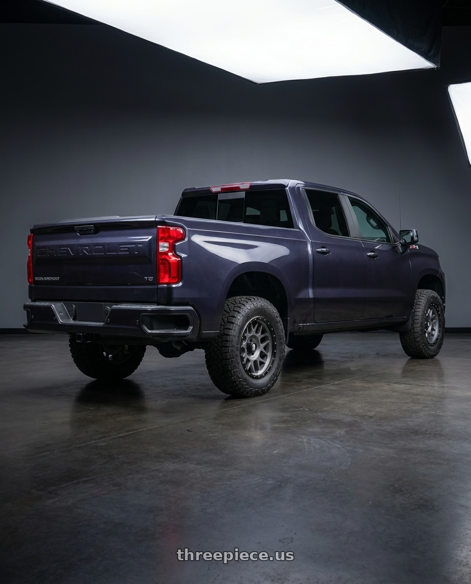 2023 Chevrolet Silverado 1500 with XD XD127 BULLY 6X139.7 20X9 +0 MATTE GRAY BLACK RING wheels rear three quarter view meaty tires